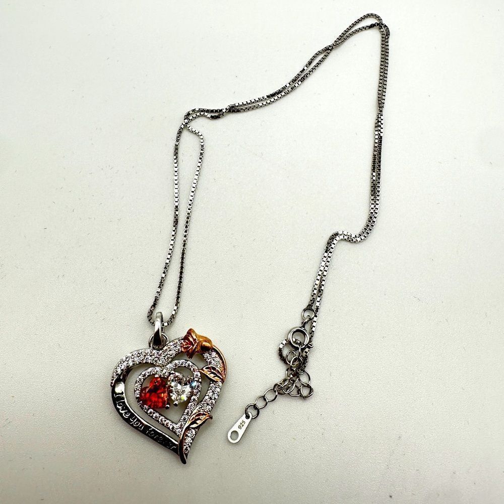 NIB Sterling silver,‎ possibly gold plated, heart necklace with cz diamonds!